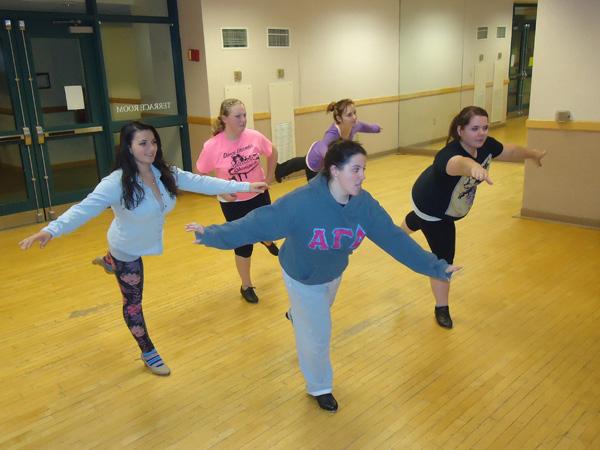 Dancers perform in large numbers