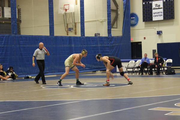 Wrestlers dominate, but still hungry