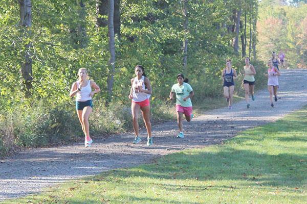 Pitt-Johnstown cross-country runners prepare for their upcoming race Oct. 3 at Frostburg (Md.) State University.
