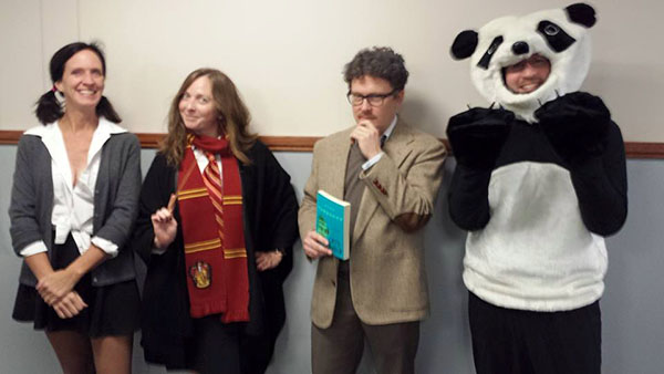 (Left to right) Catherine Cox, Marissa Landrigan, Jeremy Justus and Paul Lucas dress in their winning Halloween costumes.