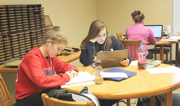 Gabrielle Yetter (left) and Lauren Fischer study for final exams.