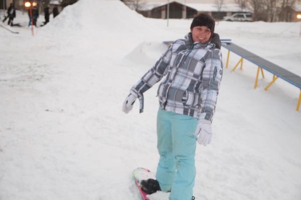 Junior Lorin Simboli participates in the Rail Jam snowboarding contest last Friday in front of the library and Campus Mall. 