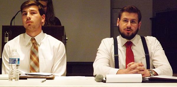 Presidential candidate Kyle Maguire (left) and vice presidential candidate Nick DiGiorgio (right) speak at a debate.