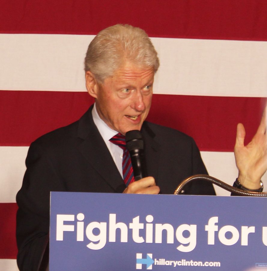 Former President Bill Clinton speaks at a campus Hillary Clinton rally.