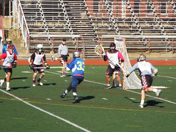 Michael Dowling making a play against an Indiana University of Pennsylvania player.