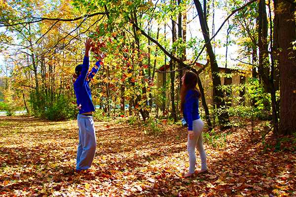 Freshmen Alex Berkhimer (left) and Veeka Needhamn enjoy campus in fall.