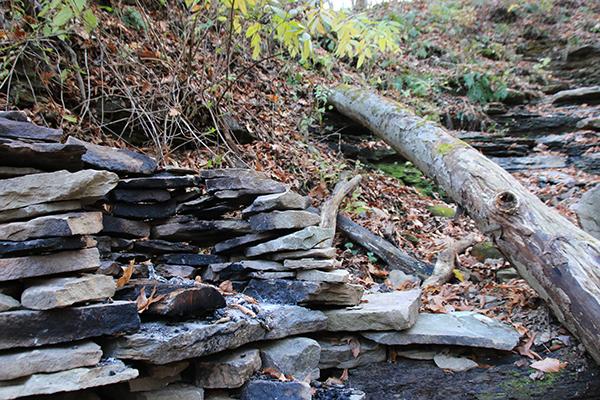 The waterfall area is approximately three-quarters of a mile from the north lodges and includes a fire pit and seating areas.