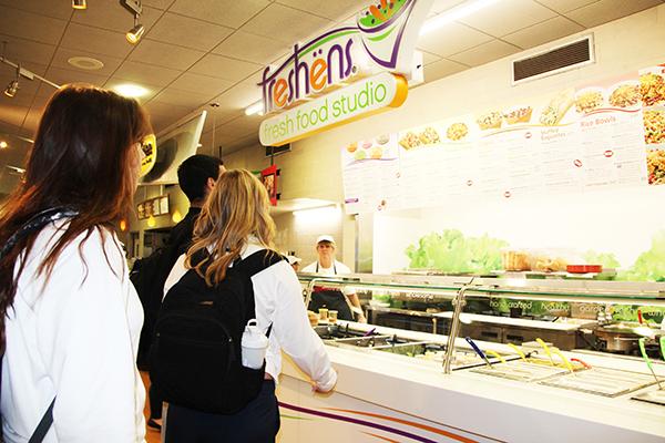 Students wait to order from Freshens, a retail-style location in the Tuck Shop.