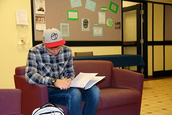 Sophomore Michael Gross studies outside the Cambria Room in the Student Union.