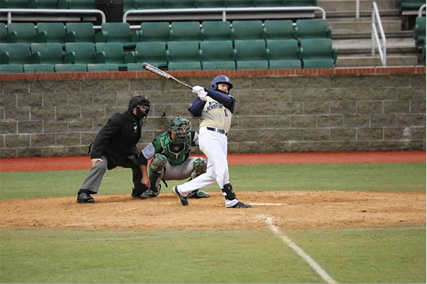 Pitt-Johnstown’s Dan Clark swings at a pitch during a loss against Slippery Rock on April 1 at Point Stadium.