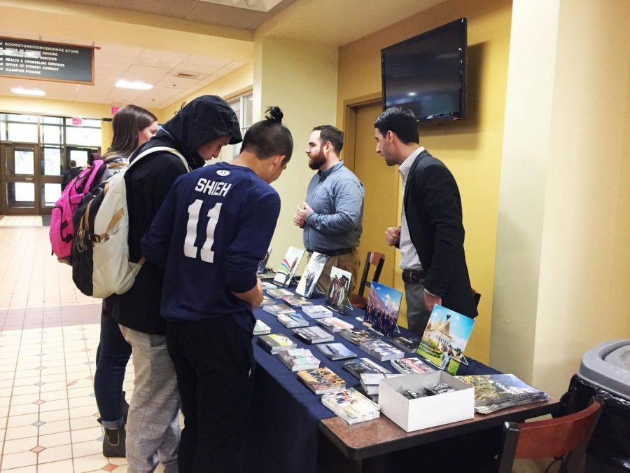 Students talk to study abroad representatives at a fair Oct. 11 on the Student Union’s second floor. 