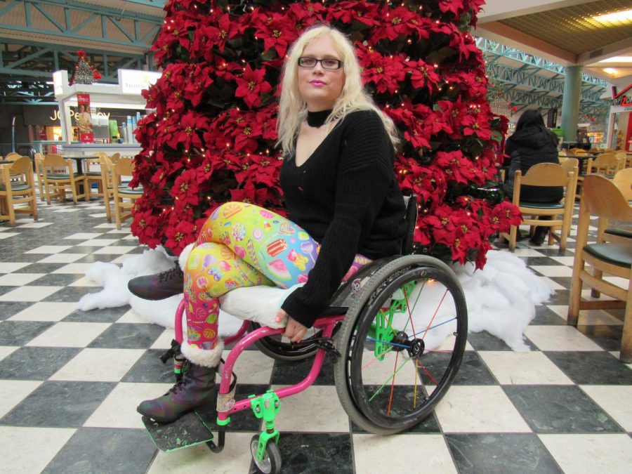 Barb Zablotney, of Windber, plans to compete in Ms. Wheelchair Pennsylvania, a beauty pageant for disabled women.  Here, she poses at the Galleria mall food court. 