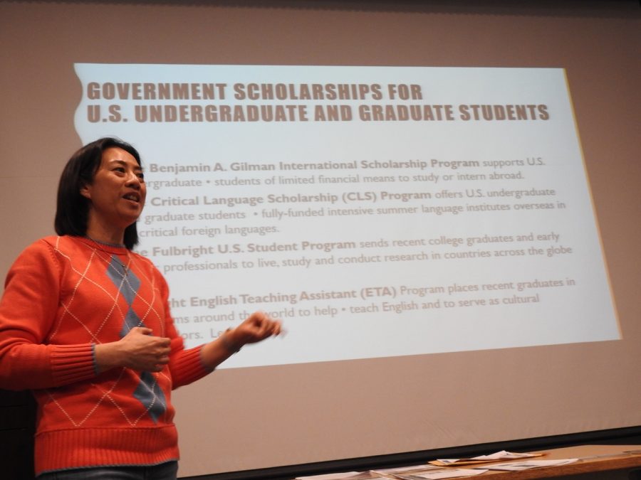 English literature instructor Tuangtip Klinbubpa-Neff tells students about scholarship opportunities at a March 27 study-abroad seminar.