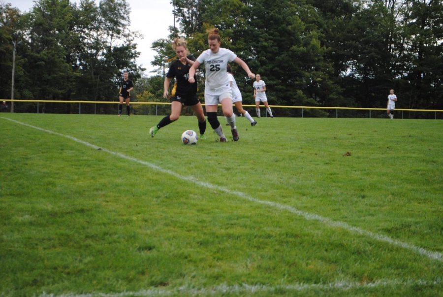 Sophomore Abby LaDuke (No. 25, center, in white) was instrumental in the Mountain Cats’ second victory this season, scoring one goal and assisting for two.