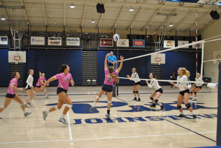 Sophomore volleyball player J.C. Longeville (No. 2, center) sets the ball against Shippensburg University on Friday at the Sports Center. Pitt-Johnstown ended up winning the game, 3-0. With the victory and a loss on Saturday, the Mountain Cats have won six of their last nine games, and are 10-10 so far this season. 
