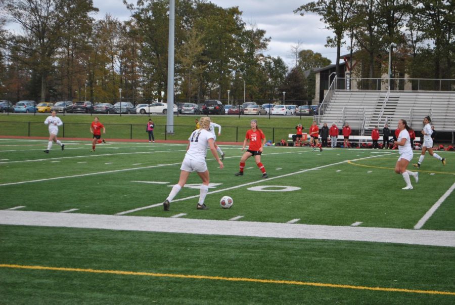 Senior defender Rachel Fleming (11) posses the ball against Edinboro last Wednesday at Richland High School’s field. Pitt-Johnstown lost, 0-1.