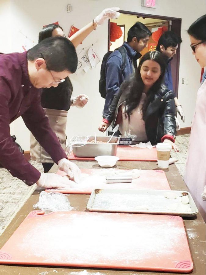 Students make dumplings under instruction at a Feb. 4 Chinese New Year celebration at Pitt-Bradford.
 | Photo courtesy of Wang Yaxuan.