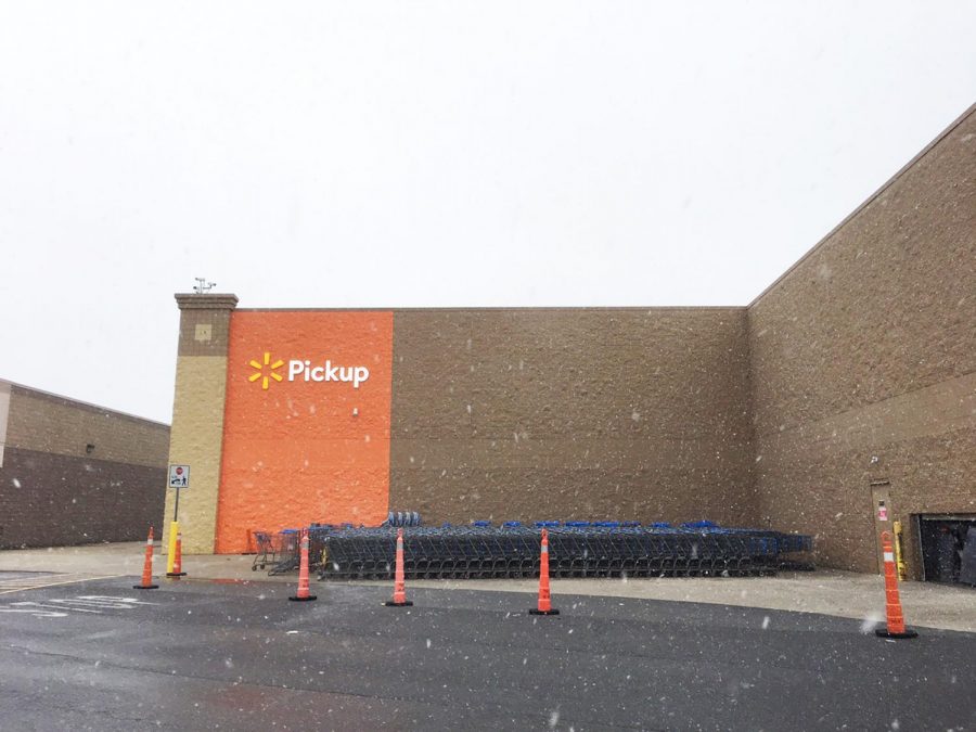 Walmart’s grocery-pickup service is located at the side of the store. Customers can park their cars in the designated parking area and wait for their groceries.