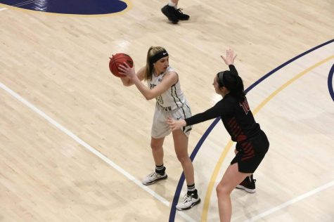 Freshman Makalyn Clapper was holding the ball and got 10 points against Mansfield University. Pitt-Johnstown won 84-59.