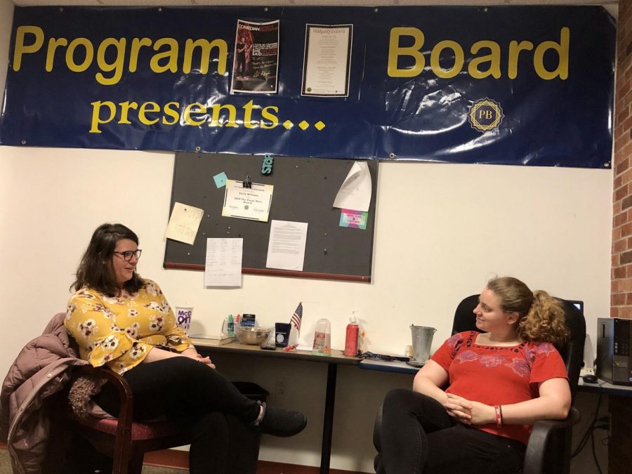 Program Board member Katelyn Zalduendo (left) and Program Board president Madison Clapsadle (right) talk in the Program Board office Thursday.  Clapsadle said she feels the friendly environment and enthusiasm that Program Board members offer is a reason why students join the club.